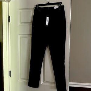 Satiny finish tailored dress pants. Well made and comfortable.